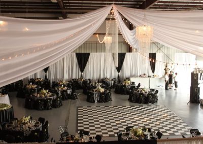 Des Moines Rentals - Ceiling Draping with Italian Lighting by Beyond Elegance Party Rentals